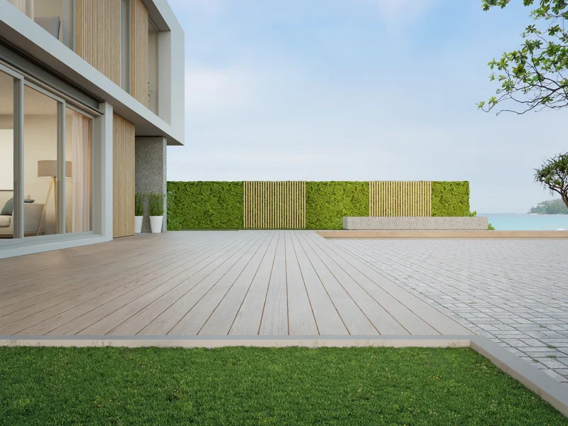 High quality concrete pavers next to wood patio decking High quality concrete pavers next to wood patio decking