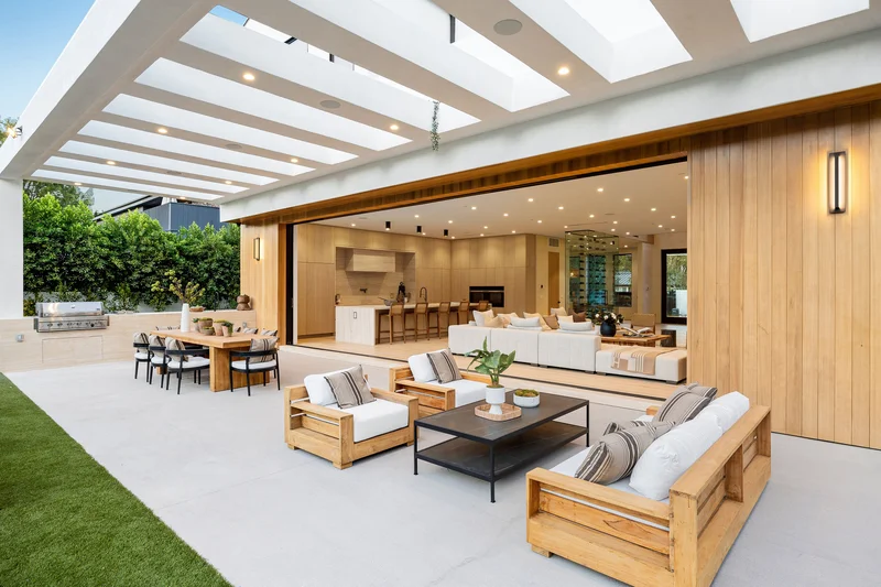 Luxury seamless concrete patio flooring under outdoor pergola Luxury seamless concrete patio flooring under outdoor pergola